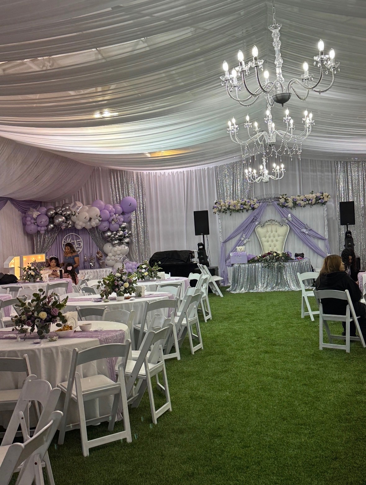 LaBodega event space decorated for a formal lavender celebration